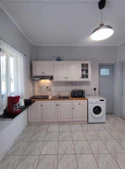 Enjoy Your Dinner in the Full Kitchen Area – Inviting space perfect for shared meals.