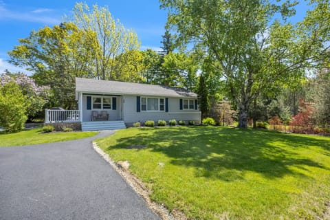 Front view from the road - plenty of parking and lush lawn to play on!
