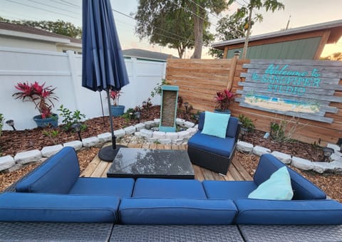 Bigger image of back yard. Better known as a chill out area.