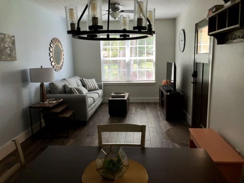 The cottage features furniture, TV & appliances, and porcelain tiled flooring. 