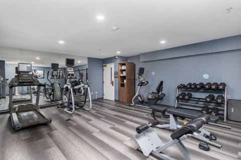Stay on track in the 24-hour fitness center with cardio and strength equipment