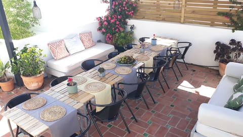 Private roof terrace to sit 12