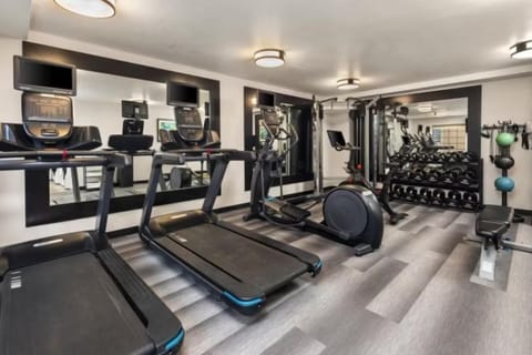 Keep up your routine in the 24-hour fitness center, stocked with cardio machines and free weights