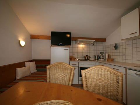 Furniture, Cabinetry, Property, Table, Wood, Interior Design, Flooring, Comfort, Television, Floor