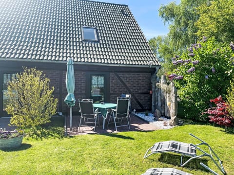 Plant, Property, Furniture, Sky, Tree, Shade, Building, Land Lot, Grass, Cottage