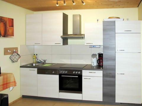 Room, Kitchen, Cabinetry, Property, Furniture, Countertop, Interior Design, Kitchen Stove, Tile, Major Appliance