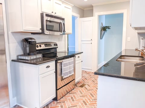 Keurig for brewing coffee with k-cups & various hot teas included.