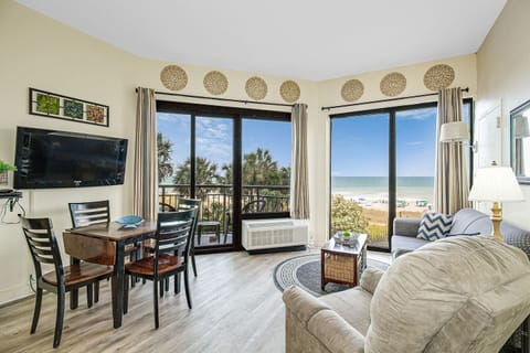 Immerse yourself in open-concept living, where the living area seamlessly transitions into the dining space, creating a spacious and welcoming environment for both relaxation and entertaining.