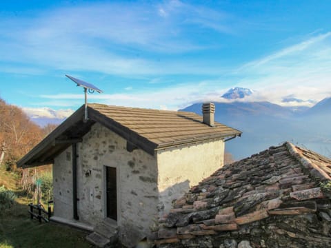 Sky, Cloud, Mountain, Plant, Wood, Building, Highland, Tree, House, Window