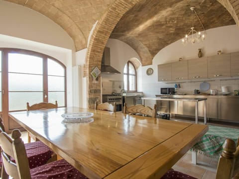 Table, Property, Furniture, Countertop, Wood, Cabinetry, Kitchen, Chair, Interior Design, Lighting