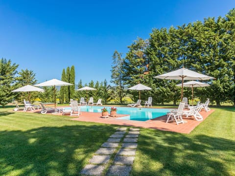 Sky, Plant, Tree, Swimming Pool, Shade, Outdoor Furniture, Land Lot, Umbrella, Grass, Urban Design