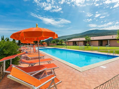 Cloud, Sky, Water, Swimming Pool, Plant, Umbrella, Building, Shade, Outdoor Furniture, Tree
