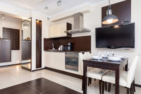 Kitchenette with dining table.