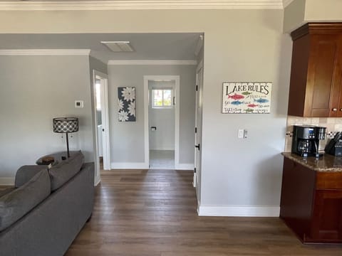 Main floor hallway to bedrooms and full bath