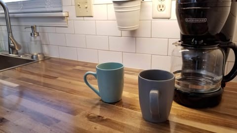 Fully stocked kitchen with coffee maker, toaster