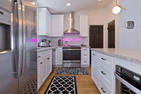 A suite of stainless steel appliances & kitchen amenities makes meal prep easy.