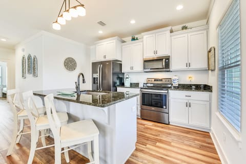 Bar Seating and Fully Stocked Kitchen