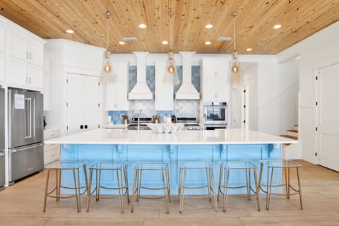 Large kitchen- This level features 11 ft tall ceilings on entire floor.