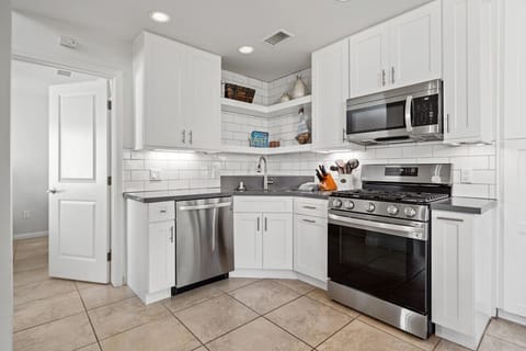 A 2021 renovated kitchen creates an open concept living area.