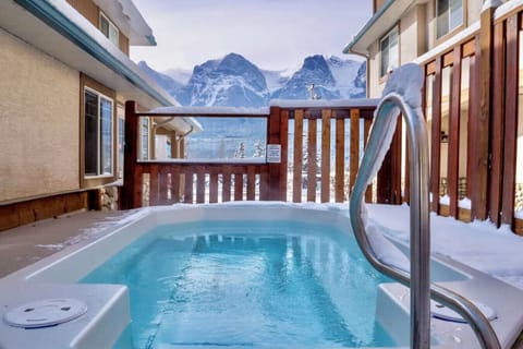 Shared  hot tub with stunning mountain views.