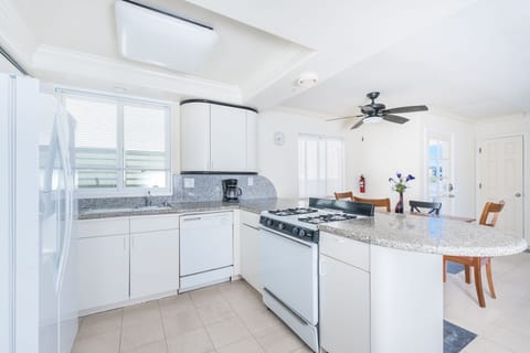 Kitchen is fully-stocked with dishes, cooking, baking and meal prep gear. All standard large and small appliances included. See listing description for more supply details.