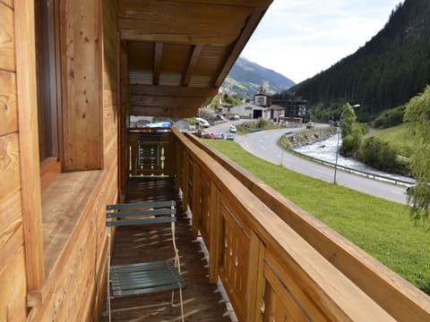 Sky, Plant, Wood, Tree, Slope, Road Surface, Asphalt, Wood Stain, Road, Cloud
