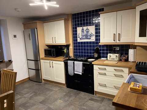 View of the kitchen with Rayburn range cooker