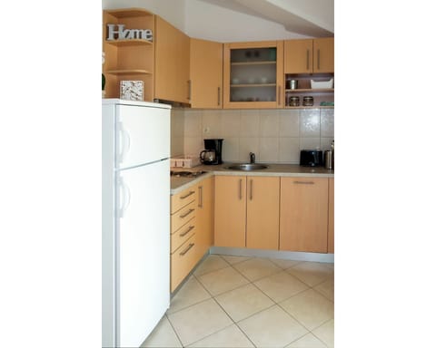 Cabinetry, Kitchen, Property, Room, Furniture, Countertop, Major Appliance, Cupboard, Yellow, Interior Design