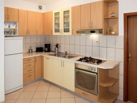 Cabinetry, Furniture, Countertop, Kitchen, Room, Property, Interior Design, Major Appliance, Cupboard, Drawer