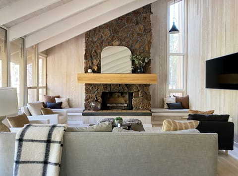 Living Room with Comfy seating and art frame tv