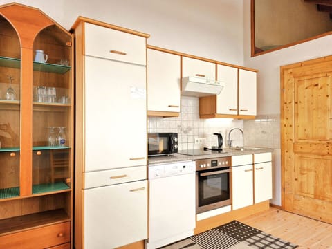 Cabinetry, Wood, Kitchen, Flooring, Furniture, Interior Design, Kitchen Appliance, Floor, Major Appliance, Countertop
