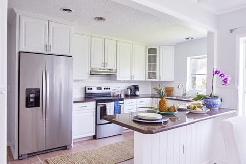 spacious kitchen open to dining area
