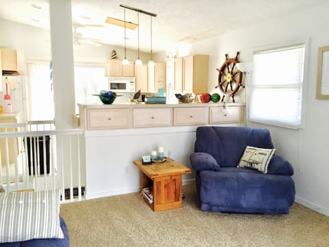 Comfy cozy recliner is great for socializing, reading and napping.