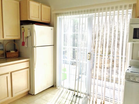 Lots of room in the kitchen with slider access to the deck and grill.