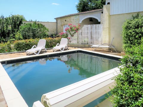 Water, Plant, Building, Swimming Pool, Sky, Chair, Body Of Water, Tree, Grass, Natural Landscape