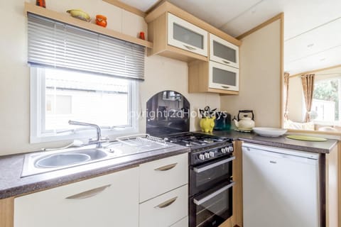 This kitchen includes a full size oven!