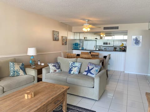 440 West 804 N Beachy decor furniture complements the abundance of sunshine entering the living room