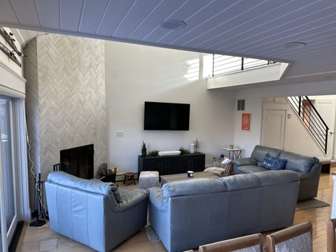 Open relaxing living/dining/kitchen room space. New wood burning place. 