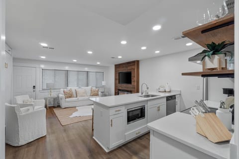 Fully equipped, upgraded, open kitchen.