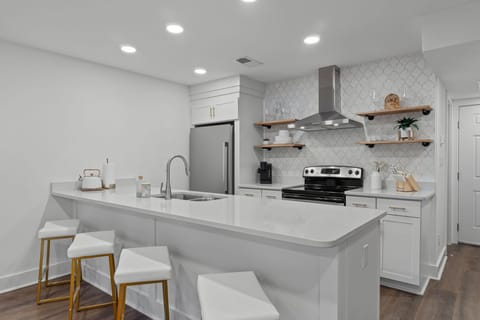 The kitchen island has plenty of space to accommodate everyone.