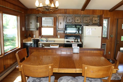 Dining and kitchen.  Surrounded by light and views!