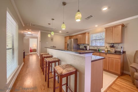 The island has 4 bar stools.