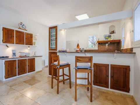 Cabinetry, Furniture, Property, Countertop, Wood, Kitchen, Table, Interior Design, Wood Stain, Drawer