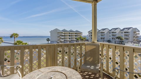 Enjoy your morning coffee while watching the birds and the boats on the bay