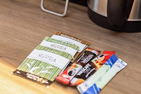 Additional amenities include coffee and tea.
