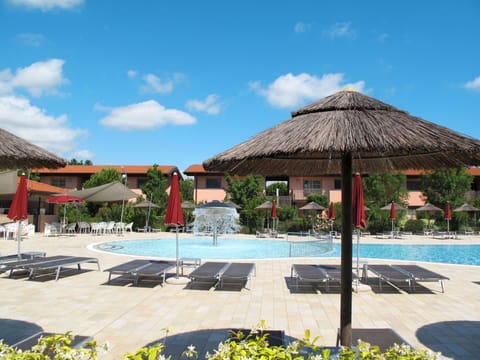 Sky, Plant, Cloud, Water, Building, Azure, Swimming Pool, Shade, Arecales, Body Of Water