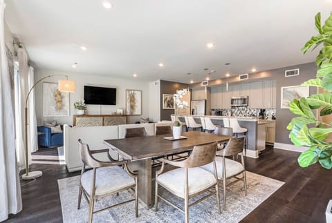 Open concept living, kitchen, and dining with ample seating. 58” Samsung Smart 4K TV for streaming and DIRECTV Entertainment. Relax on the sofa or cozy chairs after a day in NOLA! Dining for six, plus four at the bar. Plenty of natural light!