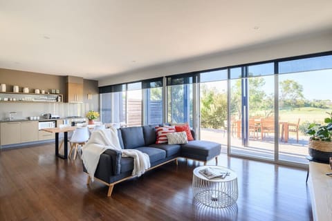 [Living Room] Sofa bed provides additional sleeping options. Amazing views.