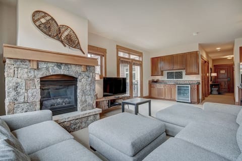 Stone fireplace in a three bedroom
