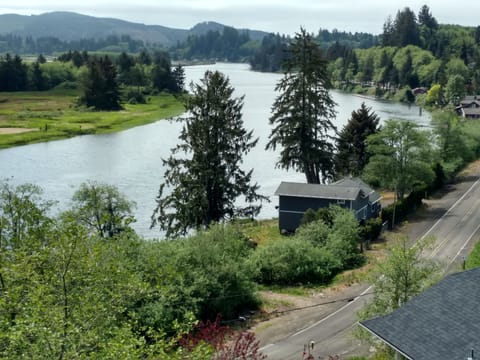 No neighbors, just the Nehalem River flowing toward the ocean.
